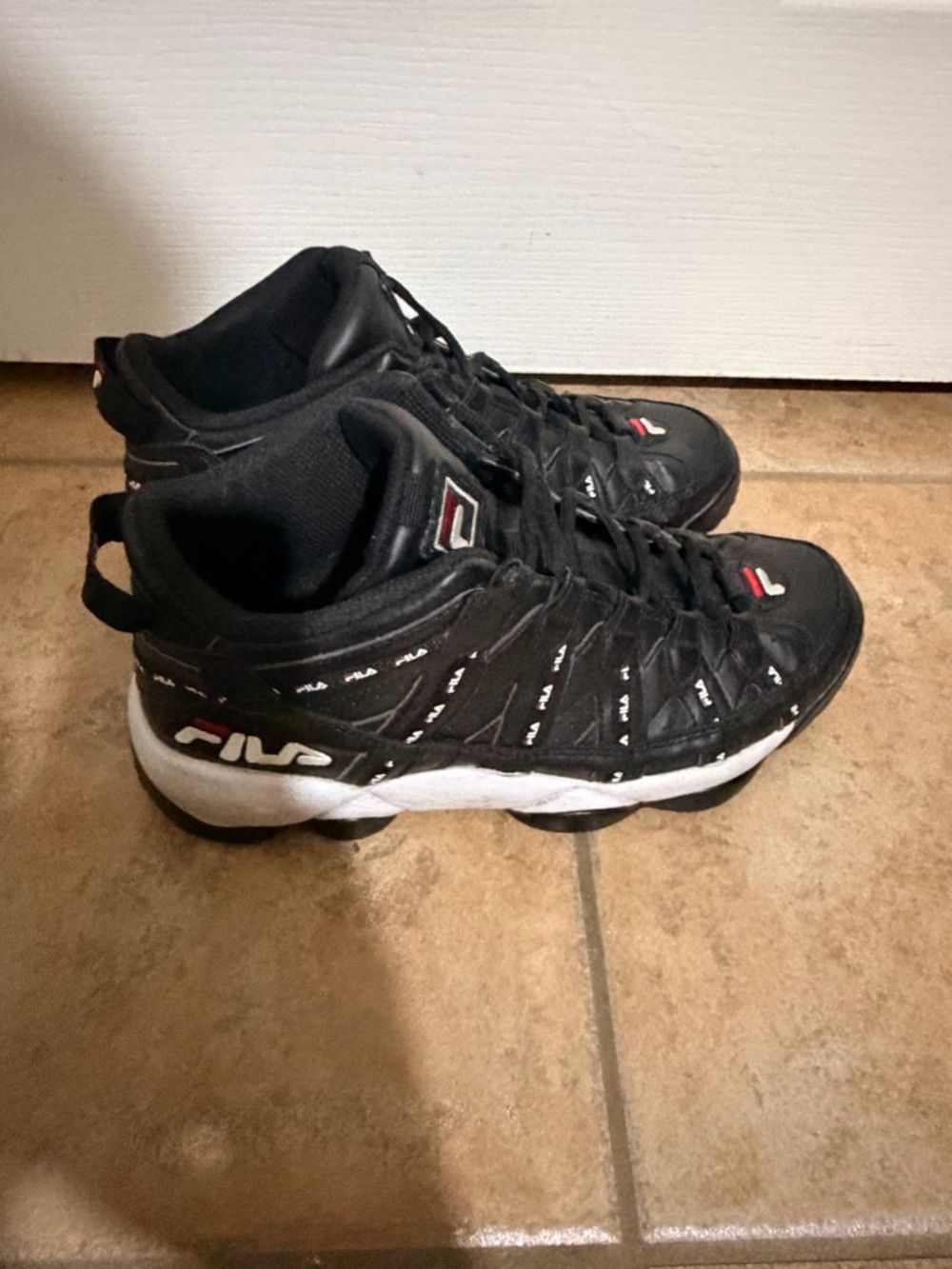 Fila Black Sneakers with White Tag Detail